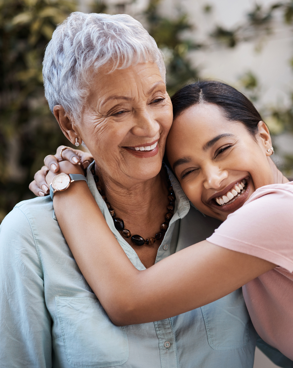 Mother and daughter laughing